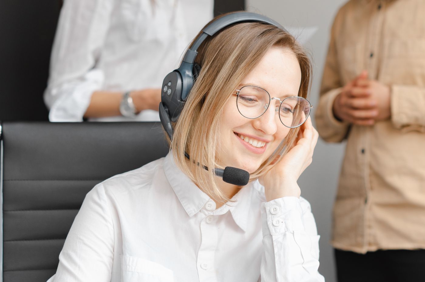 Funding advisor on a headset speaking with a client